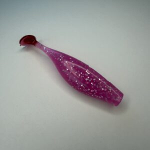 Purple glitter paddle-tail soft plastic fishing lure
