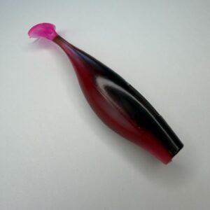 red and black paddle tail fishing lure